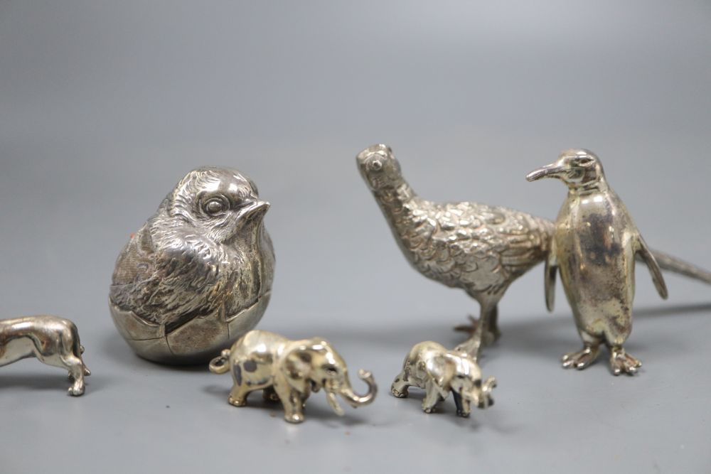 An Edwardian silver mounted hatching chick pin cushion, etc.